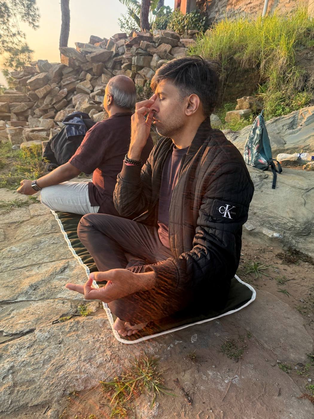 Morning breathing practice outdoors in the hills.